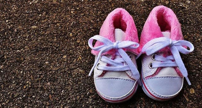 Pink and blue baby shoes