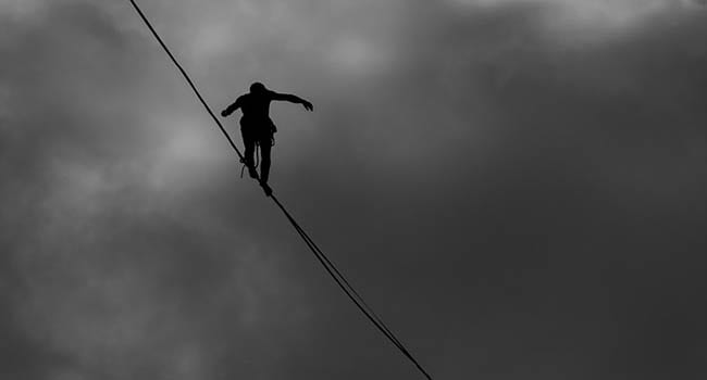 tightrope balance danger