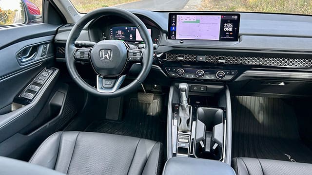 The interior of the 2024 Honda Accord is dressed with a chrome grillwork that stretches right across the dashboard.
