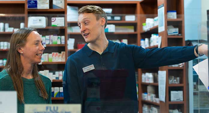 Pharmacy owner Alma Steyn and U of A graduate Preston Eshenko